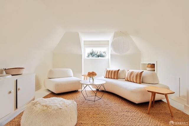 living area with lofted ceiling