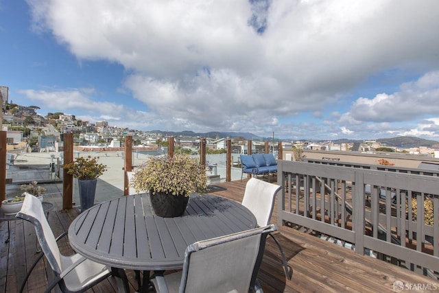 deck with a city view and a boat dock