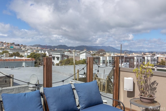 view of patio / terrace featuring a mountain view