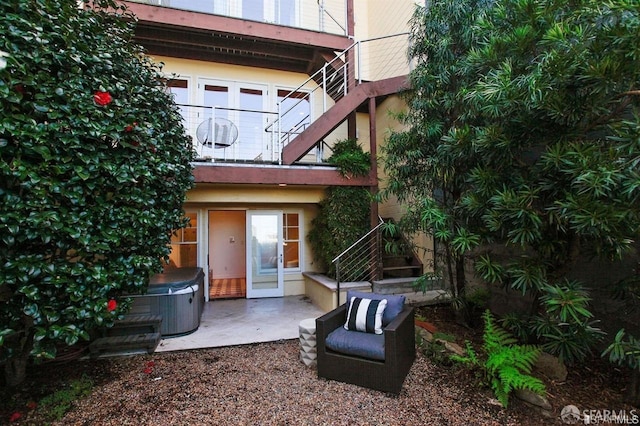 824 Green St, San Francisco, CA 94133 - rear view of property with a hot tub, stairs, a patio, and a balcony
