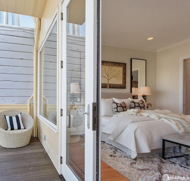 bedroom with dark hardwood / wood-style flooring