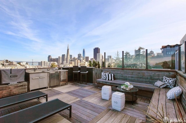 deck with an outdoor kitchen