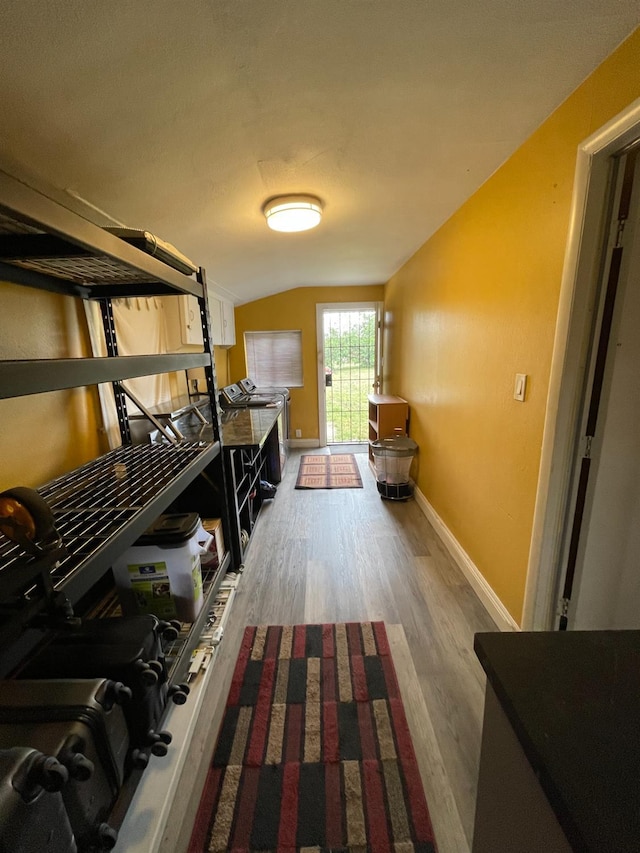 3740 26th Ave, Sacramento, CA 95820 - hall featuring wood finished floors and lofted ceiling