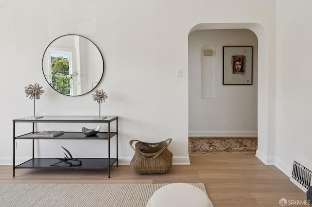 1063-1065 Sanchez St, San Francisco, CA 94114 - corridor with wood finished floors and arched walkways
