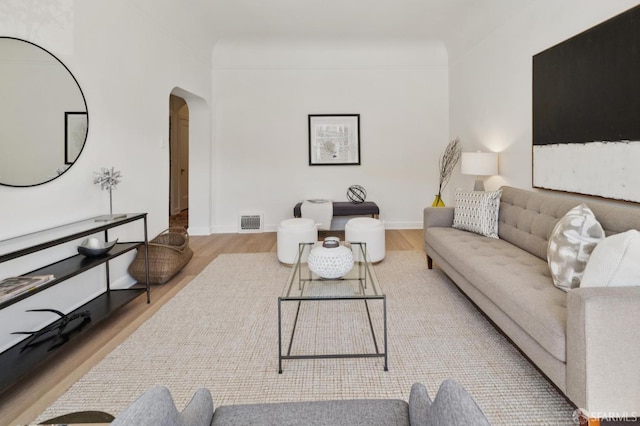 1063-1065 Sanchez St, San Francisco, CA 94114 - living area featuring arched walkways and wood finished floors