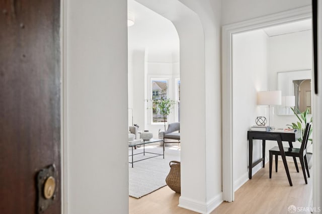 1063-1065 Sanchez St, San Francisco, CA 94114 - corridor featuring arched walkways and light wood-style floors
