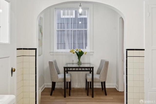 1063-1065 Sanchez St, San Francisco, CA 94114 - dining area with wood finished floors and arched walkways