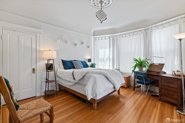 bedroom featuring light wood-type flooring