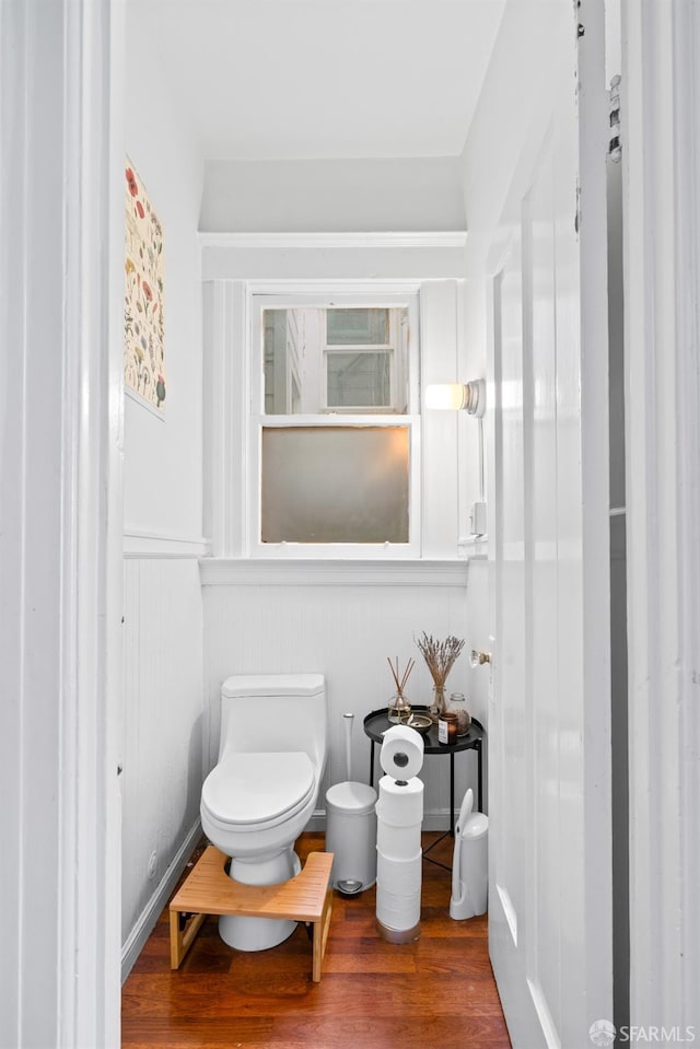 bathroom featuring toilet and hardwood / wood-style flooring