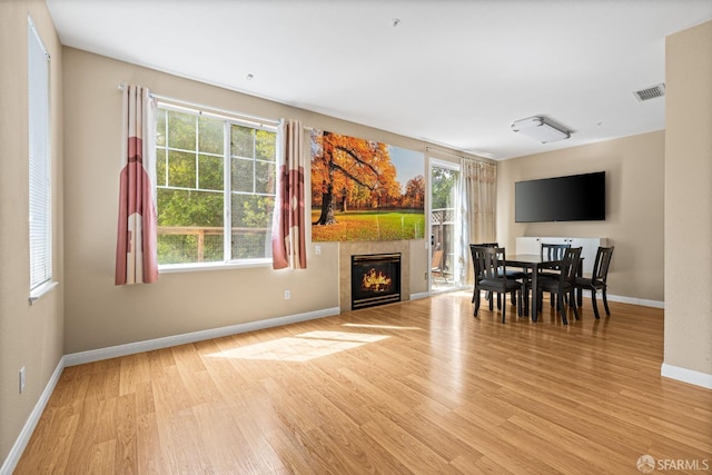 23019 Canyon Terrance Dr Unit U2, Castro Valley, CA 94552 - living area with wood finished floors, baseboards, and a tiled fireplace