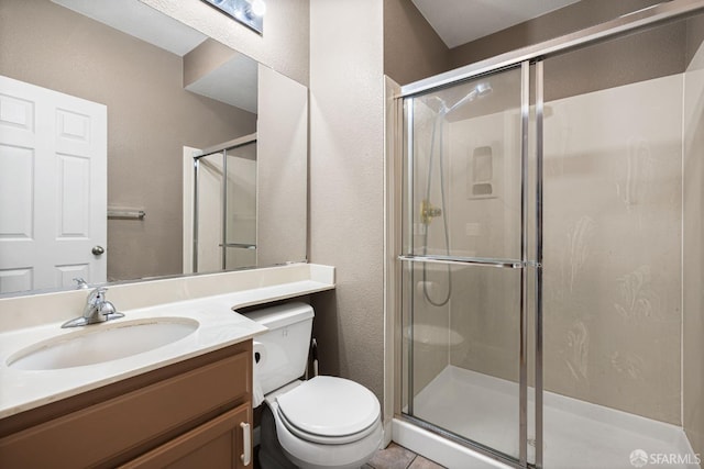 23019 Canyon Terrance Dr Unit U2, Castro Valley, CA 94552 - full bathroom featuring toilet, a textured wall, a stall shower, vanity, and tile patterned flooring