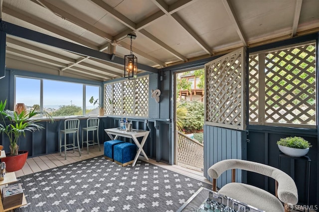 sunroom with outdoor dry bar