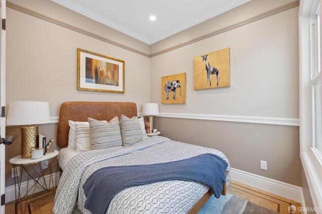 bedroom featuring crown molding, recessed lighting, and baseboards