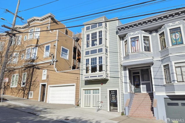 view of front of home featuring a garage and driveway