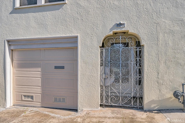 garage with a gate