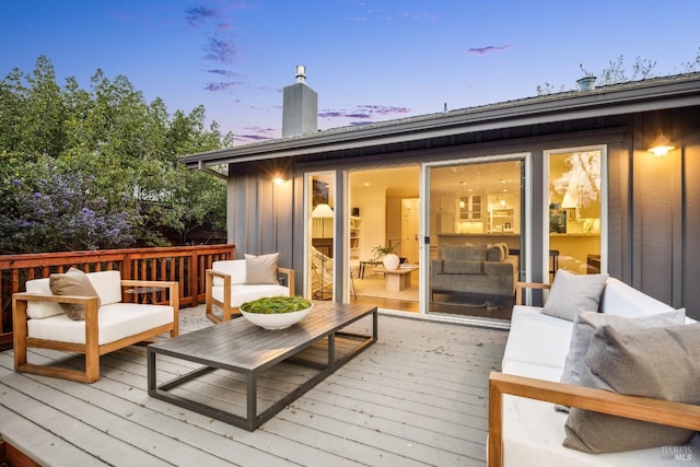 wooden deck with outdoor lounge area