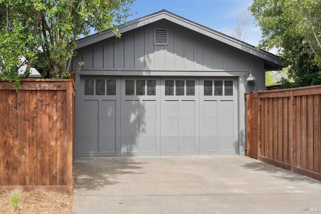 detached garage with fence