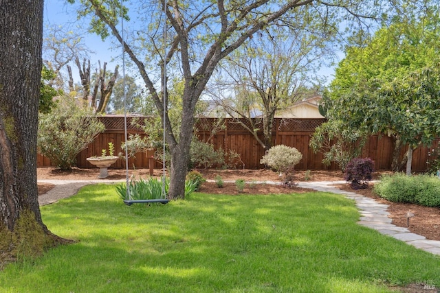 view of yard featuring a fenced backyard