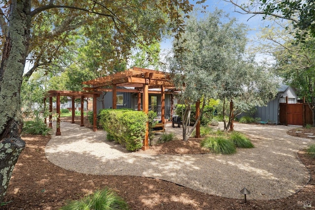 view of property's community featuring a pergola