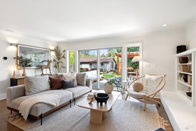 living room featuring baseboards and ornamental molding
