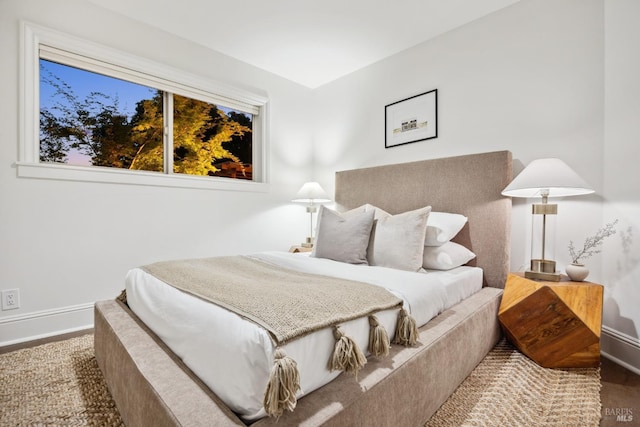 bedroom featuring baseboards