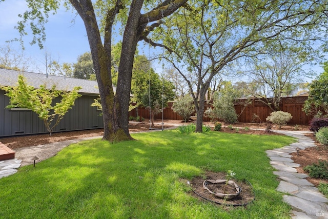 view of yard with fence