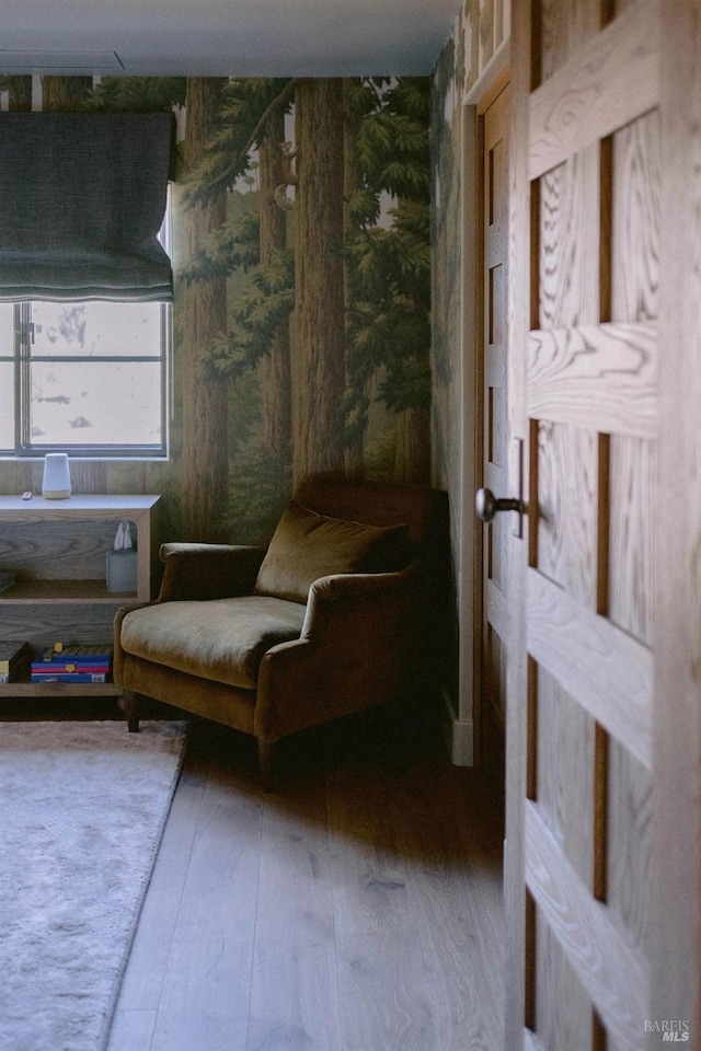 sitting room featuring hardwood / wood-style flooring