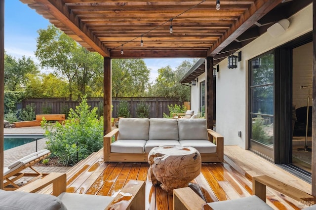 view of patio / terrace with a fenced backyard, an outdoor hangout area, a fenced in pool, and a wooden deck