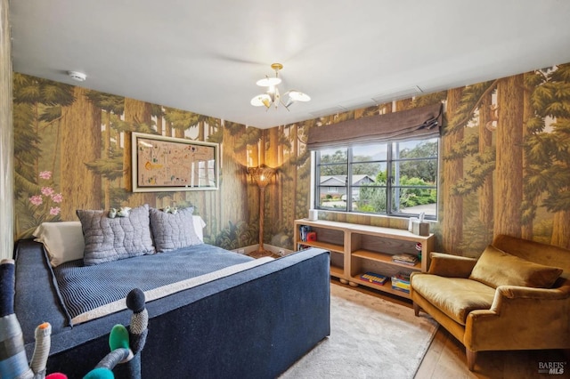 bedroom with a notable chandelier