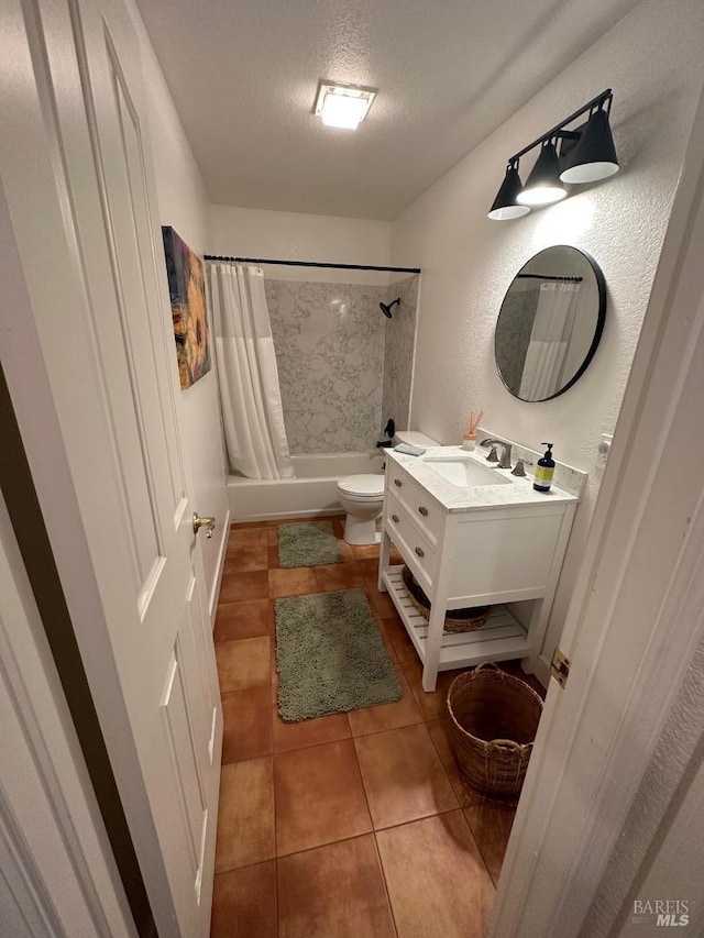 full bathroom with toilet, shower / bathtub combination with curtain, tile patterned floors, vanity, and a textured ceiling