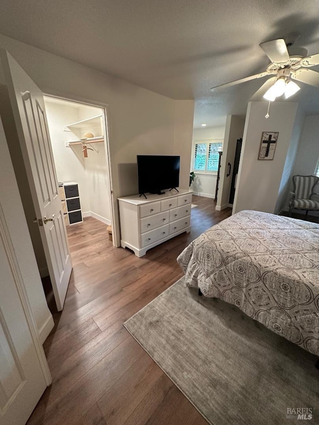 bedroom featuring ceiling fan and light hardwood / wood-style floors