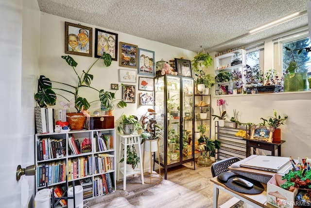 3410 Big Oak Ct, Hayward, CA 94542 - sitting room with a textured ceiling and wood finished floors