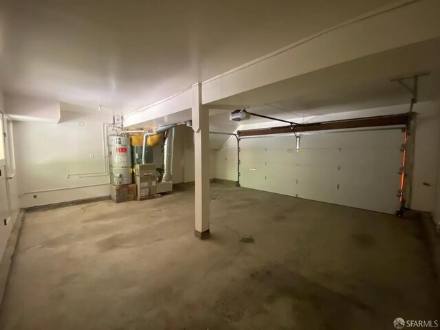 3410 Big Oak Ct, Hayward, CA 94542 - garage featuring secured water heater, a garage door opener, and heating unit