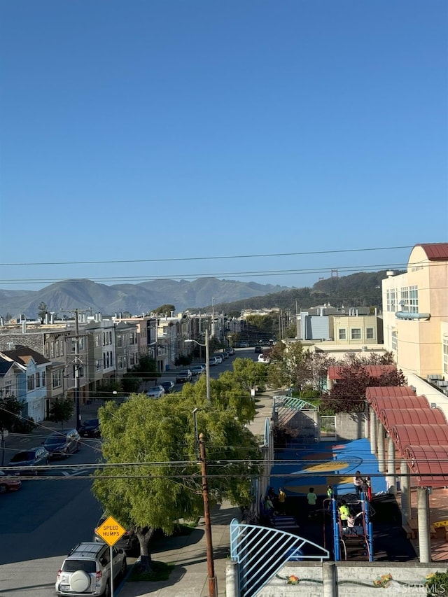 exterior space featuring a mountain view