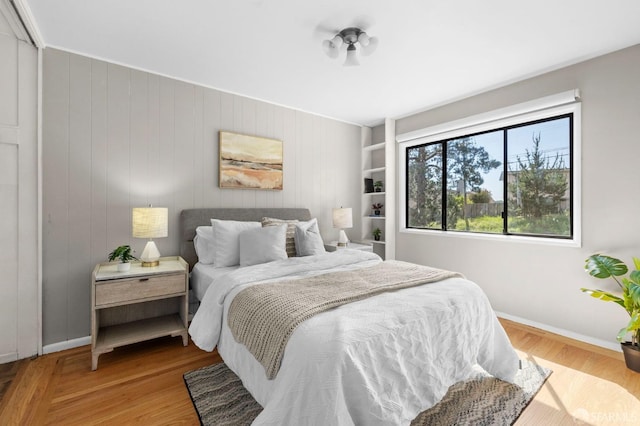 458 Alhambra Rd, South San Francisco, CA 94080 - bedroom featuring wooden walls, baseboards, and wood finished floors