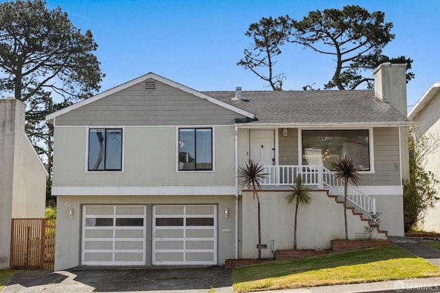 458 Alhambra Rd, South San Francisco, CA 94080 - view of front of house featuring a shingled roof, an attached garage, stairway, a chimney, and driveway