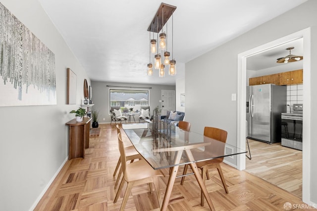 458 Alhambra Rd, South San Francisco, CA 94080 - dining area with baseboards and a chandelier