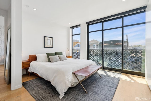 131 Missouri St Unit 402, San Francisco, CA 94107 - bedroom featuring a wall of windows, light wood-style floors, and recessed lighting