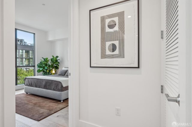 bedroom featuring wood finished floors