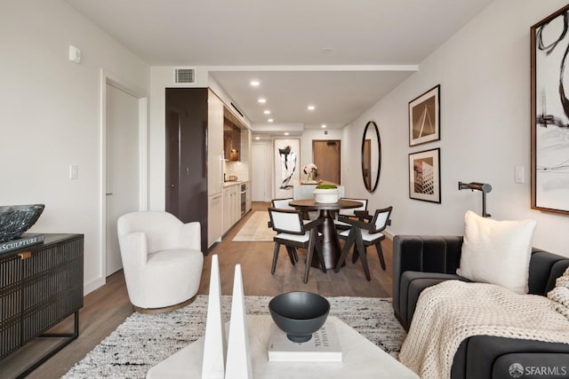 living room featuring light wood-type flooring