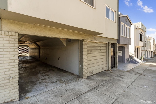 garage featuring a residential view