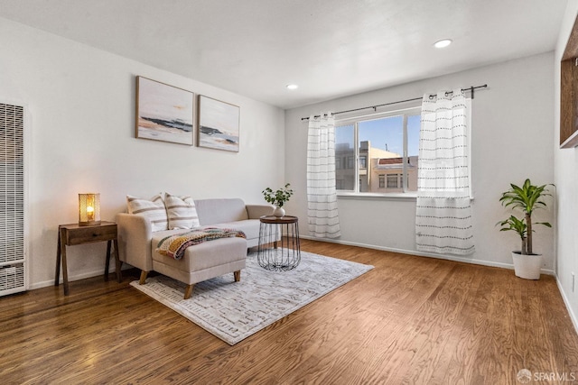 bedroom featuring recessed lighting, wood finished floors, and baseboards