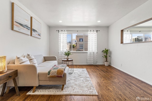 living room with recessed lighting, wood finished floors, and baseboards