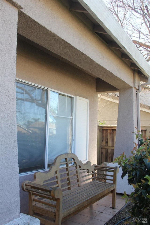 exterior space featuring stucco siding