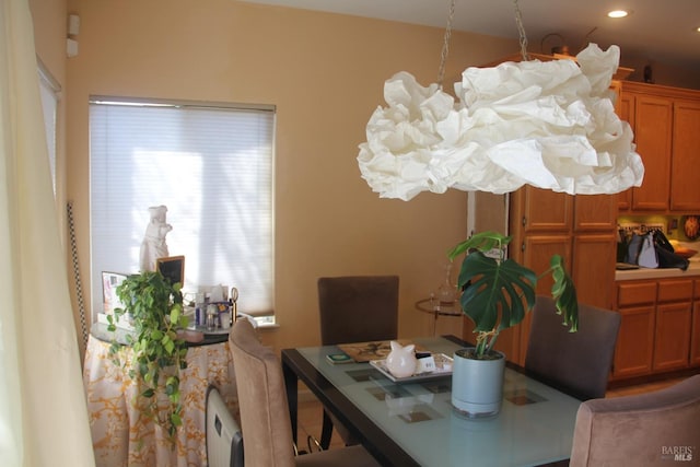 dining room featuring recessed lighting