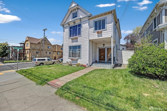 view of front of home with a front lawn