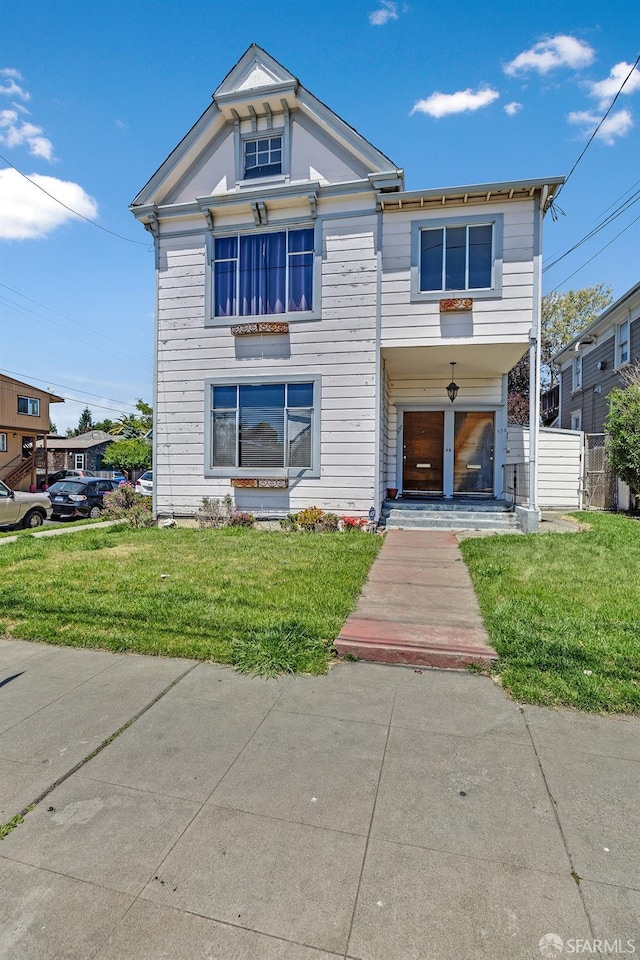 view of front facade with a front yard