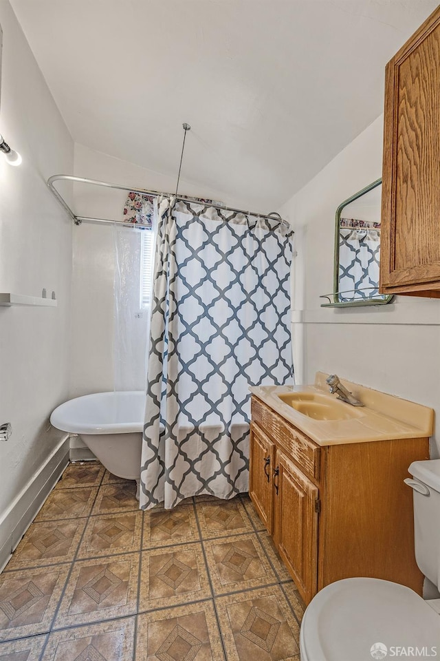 full bathroom featuring vanity, toilet, and shower / bathtub combination with curtain