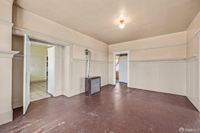 unfurnished bedroom with dark hardwood / wood-style floors