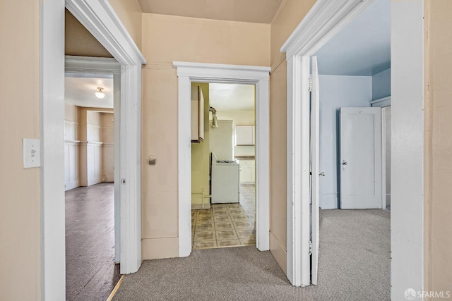 corridor with carpet floors